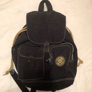 VINTAGE Kipling Mini black drawstring backpack